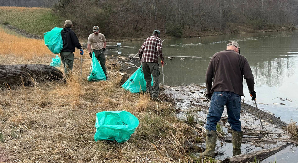 people picking up trash at WMA